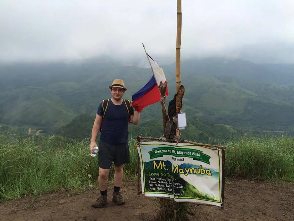 Mount Maynoba summit with Filipino flag
