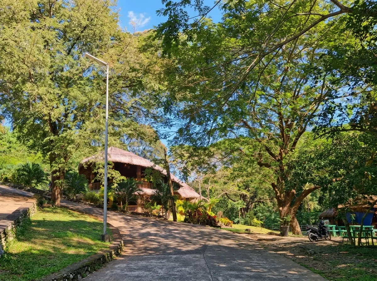 Rustic open-air dining at Kusina Kabakiran inside Candon City Eco Park